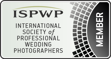 Logo of the International Society of Professional Wedding Photographers (ISPWP), featuring a stylized camera icon with the initials ISPWP in bold, elegant typography.